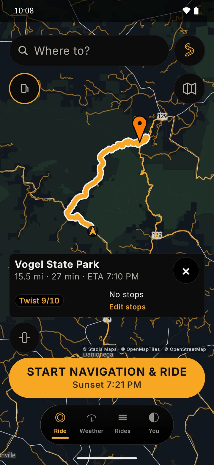 RIDE route card on a dark map: a 15.5 mile, 27 minute route to Vogel State Park with a Twist 9 out of 10 chip, Edit stops, and a Start navigation and ride button.