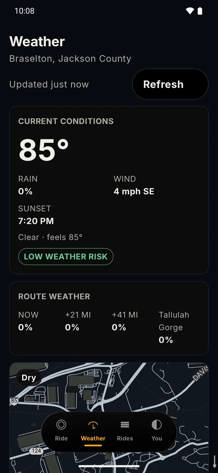 RIDE Weather tab in the Dark theme with a Dark map: current conditions, a Low weather risk chip and route weather.